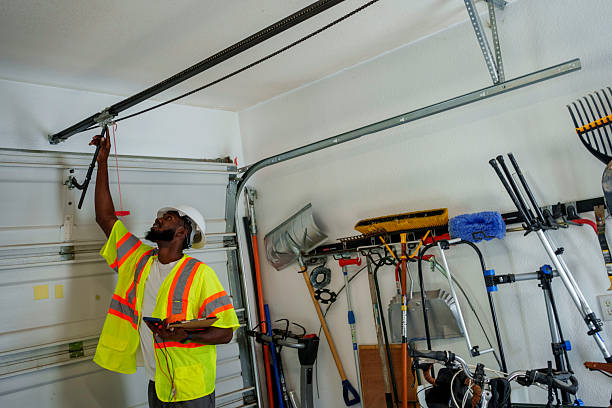 Professional Garage Door Panel Replacement technician working in Filer, ID